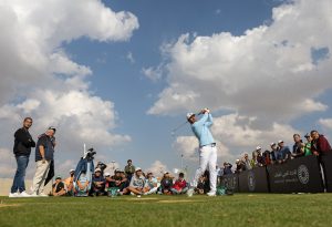 Chase Koepka gives Egyptian youngsters a lesson on the Madinaty Golf Course driving range